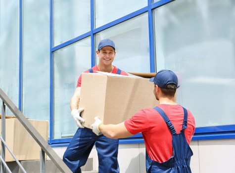 Moving van and movers preparing for a residential relocation in SE16
