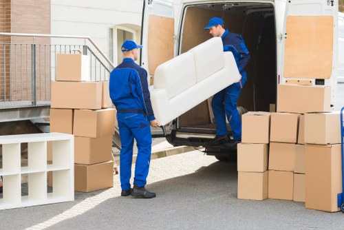 Office relocation planning in Rotherhithe with business furniture and moving boxes