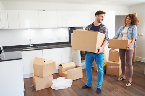 Loading furniture into a moving van near Rotherhithe apartments