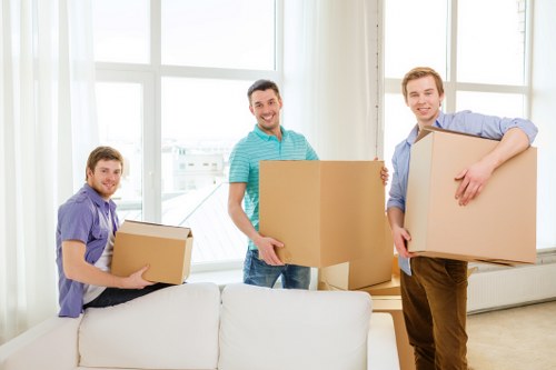 Packed moving boxes and furniture for a flat move in SE16