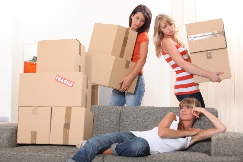 Moving boxes and furniture prepared for a Rotherhithe relocation